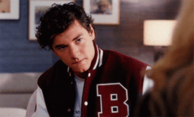 Young Man In Varsity Jacket With B GIF
