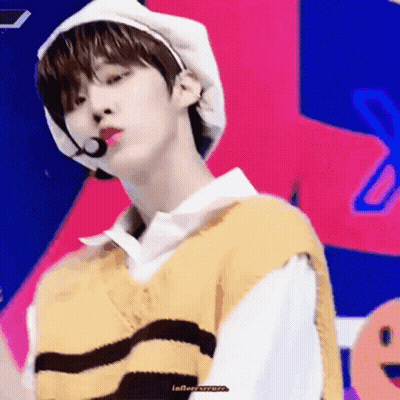 Young Man In White Hat And Yellow Vest GIF