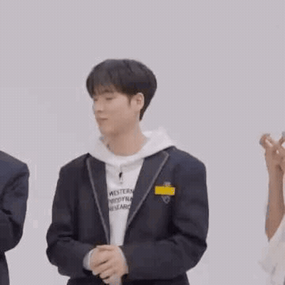 Young Man In White Hoodie And Suit GIF