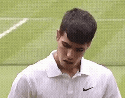 Young Man In White Nike Polo On Tennis Court GIF