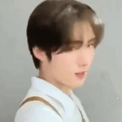 Young Man In White Shirt And Brown Tie GIF