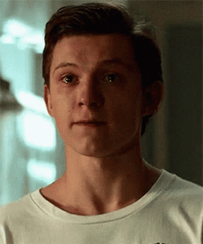 Young Man In White Shirt Close Up GIF