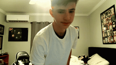 Young Man In White Shirt In Bedroom GIF