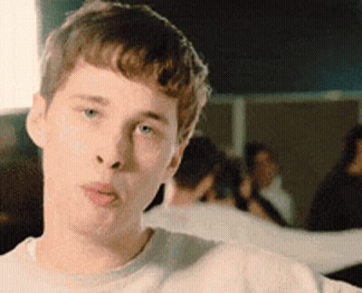 Young Man In White Shirt Making A Face GIF