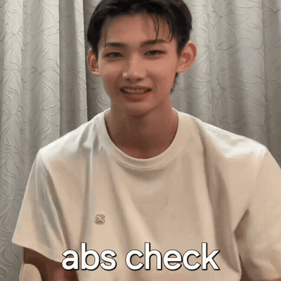 Young Man In White Shirt Saying Abs Check GIF