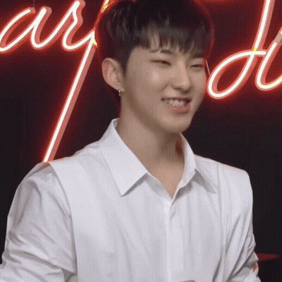 Young Man In White Shirt Smiling Neon Adore GIF
