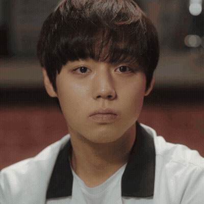 Young Man In White Shirt With Black Collar GIF