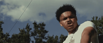 Young Man In White Shirt With Necklace Letter T GIF