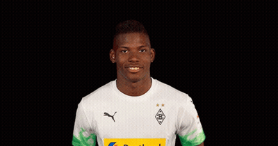 Young Man In White Shirt With Yellow Postbank Logo GIF