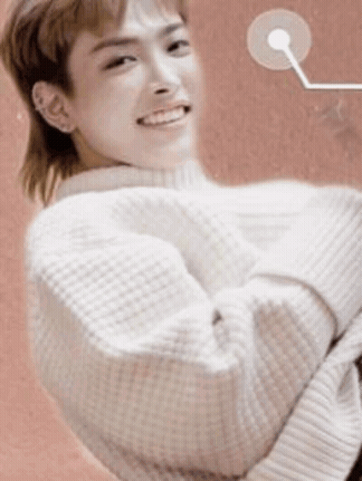 Young Man In White Sweater With Mullet Smiling GIF
