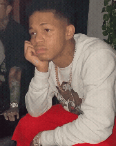 Young Man In White Sweatshirt And Red Pants GIF