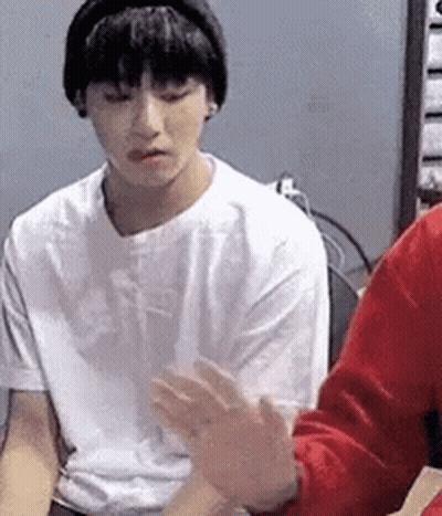 Young Man In White T-Shirt And Black Headband GIF