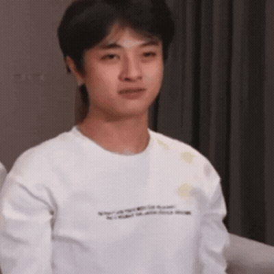 Young Man In White T-Shirt Making Funny Face GIF