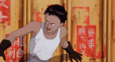 Young Man In White Tank Top And Black Gloves In Front Of Yellow Wall With Chinese Writing GIF
