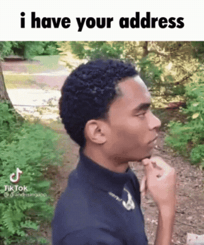 Young Man In Woods With Hand On Chin Saying I Have Your Address GIF