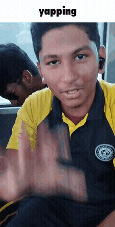 Young Man In Yellow And Black Shirt Making Stop Gesture GIF