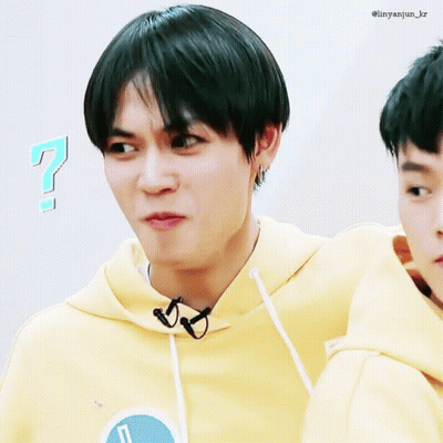 Young Man In Yellow Hoodie Making Funny Face GIF