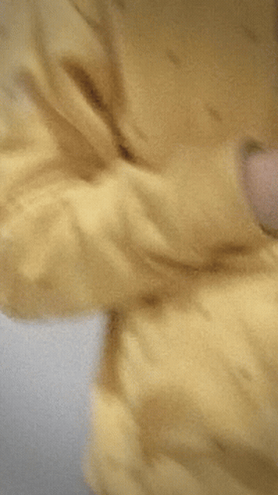 Young Man In Yellow Hoodie Taking Selfie GIF