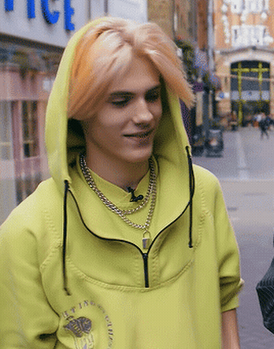 Young Man In Yellow Hoodie With Chain GIF