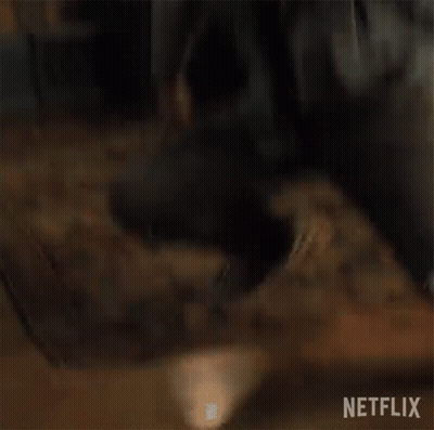 Young Man Kneeling On Floor GIF