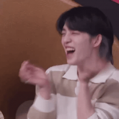 Young Man Laughing And Clapping Hands GIF