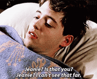 Young Man Laying In Bed With Blue Blanket Saying Jeanie Is That You GIF