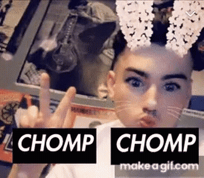 Young Man Making Face Saying Chomp GIF