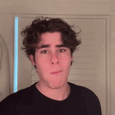 Young Man Making Funny Face GIF