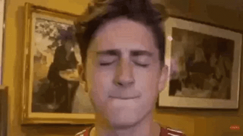 Young Man Making Funny Face GIF