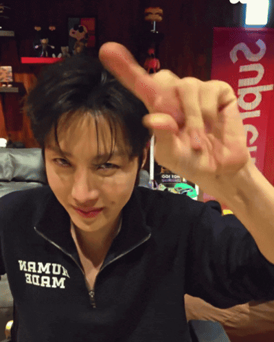 Young Man Making Funny Face Saying Clocked GIF