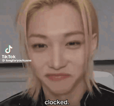 Young Man Making Funny Face Saying Clocked GIF