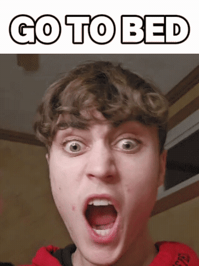 Young Man Making Funny Face Saying Go To Bed GIF