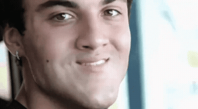 Young Man Making Funny Face Smiling GIF