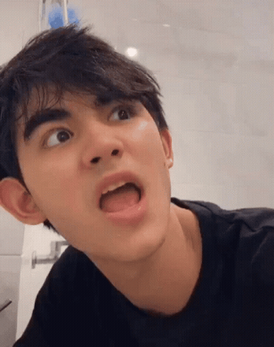 Young Man Making Funny Face GIF