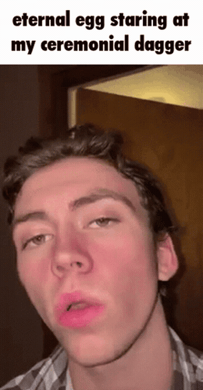 Young Man Making Funny Face With Eternal Egg Caption GIF