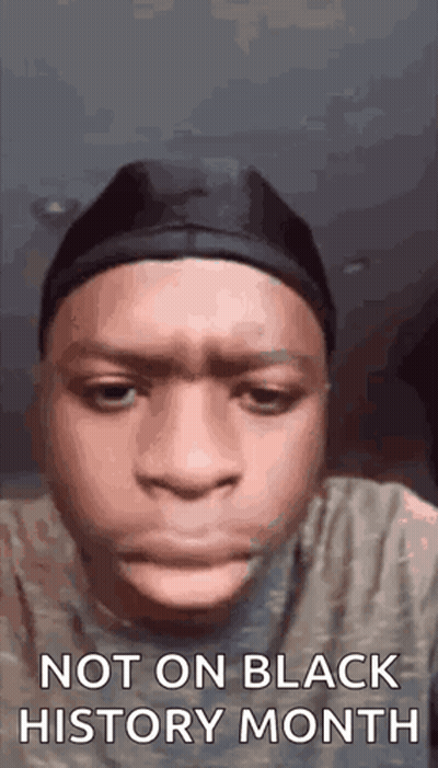 Young Man Making Funny Face With Hat And Headband GIF