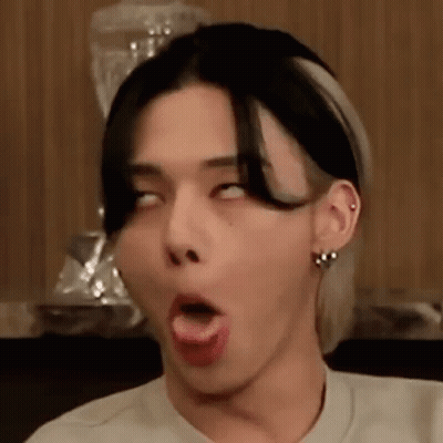Young Man Making Funny Face With Tongue Out GIF