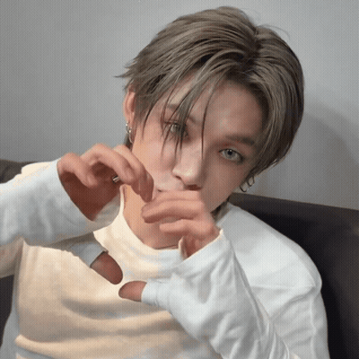 Young Man Making Heart Shape With Hands GIF