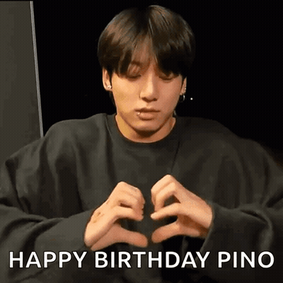 Young Man Making Heart Shape With Hands In Black Sweatshirt GIF