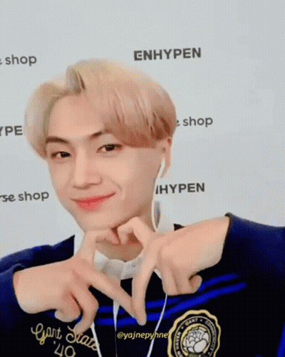 Young Man Making Heart With Fingers GIF