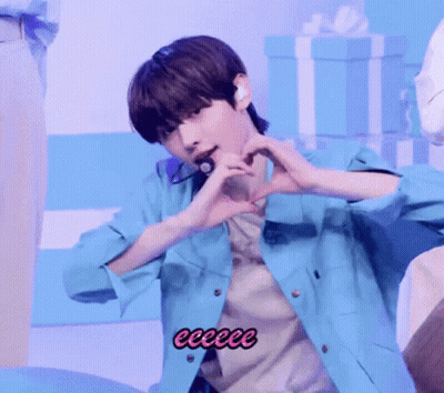 Young Man Making Heart With Hands In Blue Jacket GIF