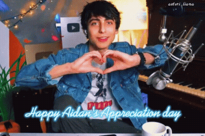 Young Man Making Heart With Hands GIF