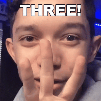 Young Man Making Peace Sign With Three GIF