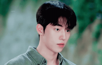Young Man On Green Background Saying Eternity GIF