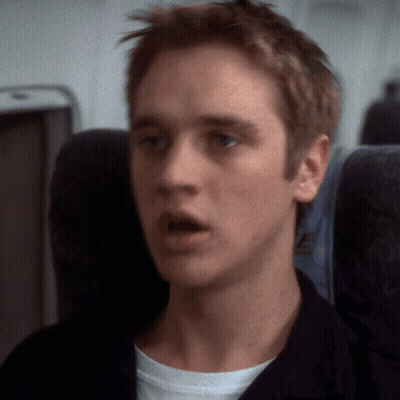 Young Man On Plane With United Airlines Shirt GIF