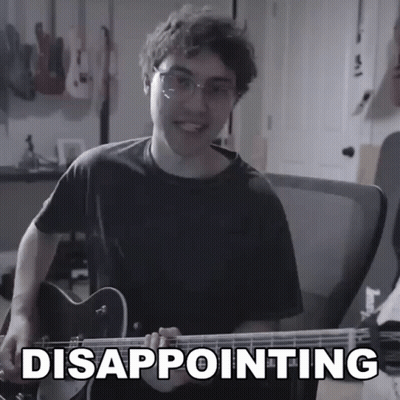 Young Man Playing Guitar With Disappointing GIF