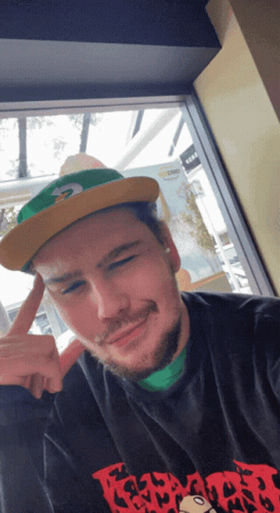 Young Man Playing Hype Chicken Dance GIF