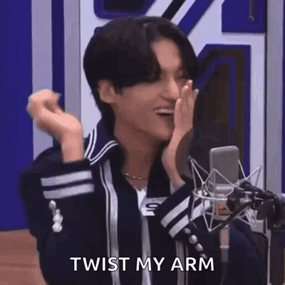 Young Man Pointing At Camera In Front Of Microphone GIF
