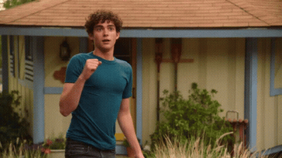 Young Man Running In Blue Shirt GIF
