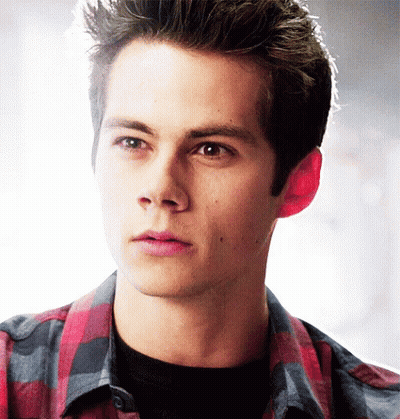 Young Man's Face In Front Of Window With Blinds GIF